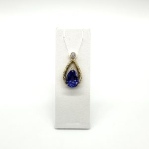 bijou occasion or jaune 750 millièmes 18 carats bijouterie frot guilde pendentif tanzanite diamant