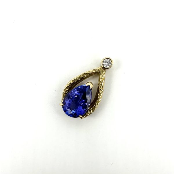 bijou occasion or jaune 750 millièmes 18 carats bijouterie frot guilde pendentif tanzanite diamant